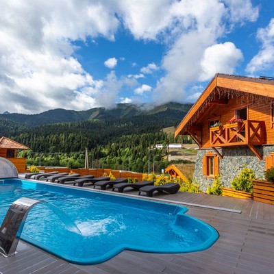 Отель Arkhyz Royal Resort & SPA - Панорамный подогреваемый бассейн